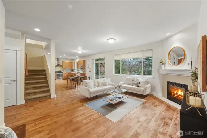 The large main floor living, dining and kitchen area.