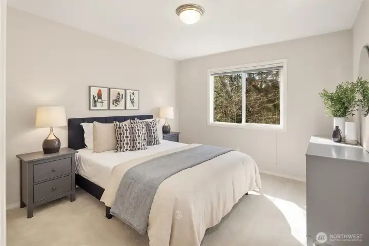 All 3 additional bedrooms are located on the upper floor with the primary suite.