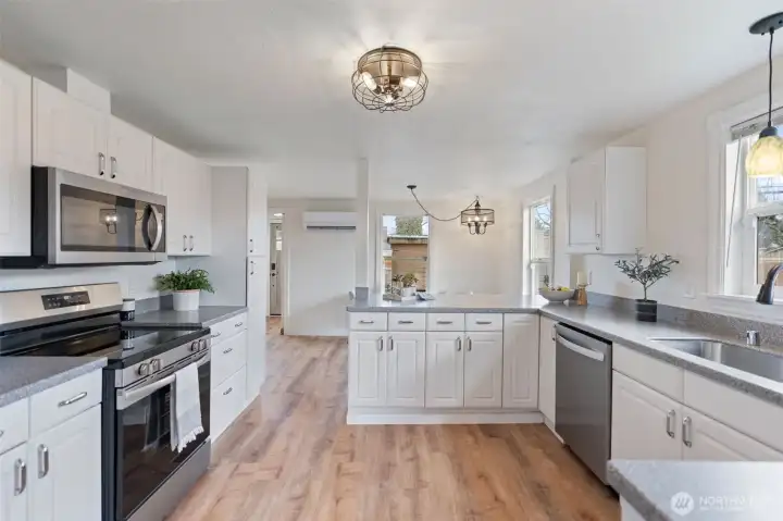 Large kitchen featuring stainless appliances