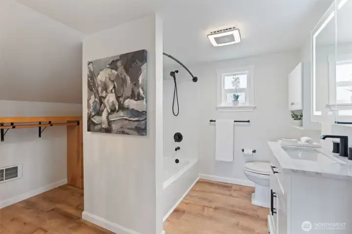 Second floor updated full bath with extra closet space