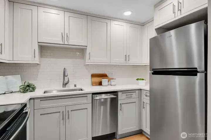 New fridge in 2025! Stainless appliances, soft-close cabinets, and granite countertops.