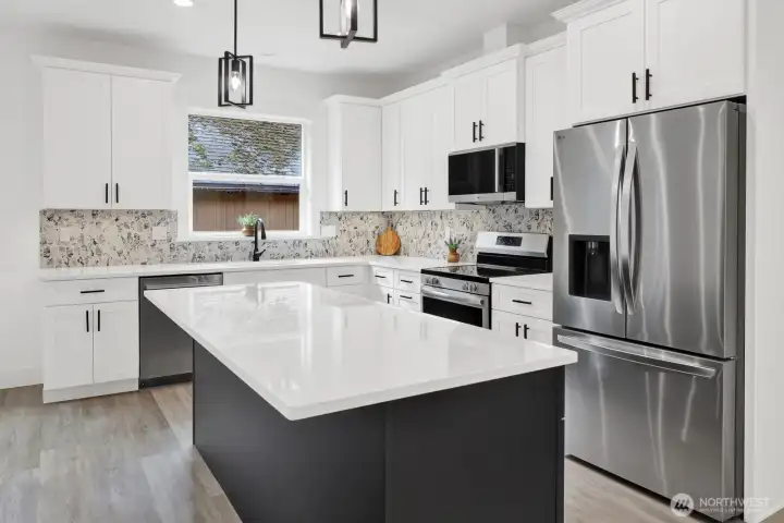 Open kitchen with plenty of counter space and storage