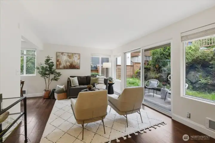 This is an end unit that has a private outdoor space and lots of windows to let light in. This is an end unit that has a private outdoor space and lots of windows to let light in.