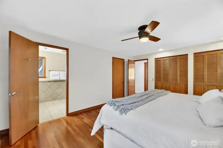 Primary with 2 closets plus a third Walk-In Closet - King Bed easily fits in here.