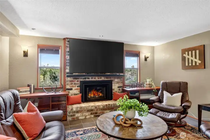 Gas fireplace and built-in cabinetry.