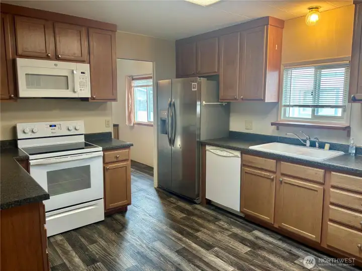 Kitchen is good size with lots of cabinets