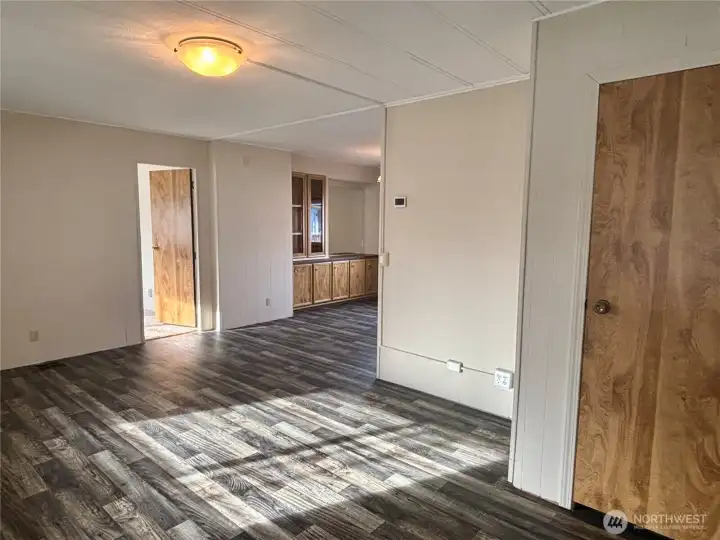 Coming in from front door looking left to family room and dining room.