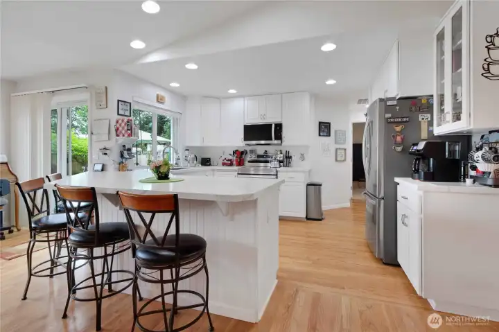 Kitchen has been tastefully updated with new granite counter tops and stainless steel appliances.