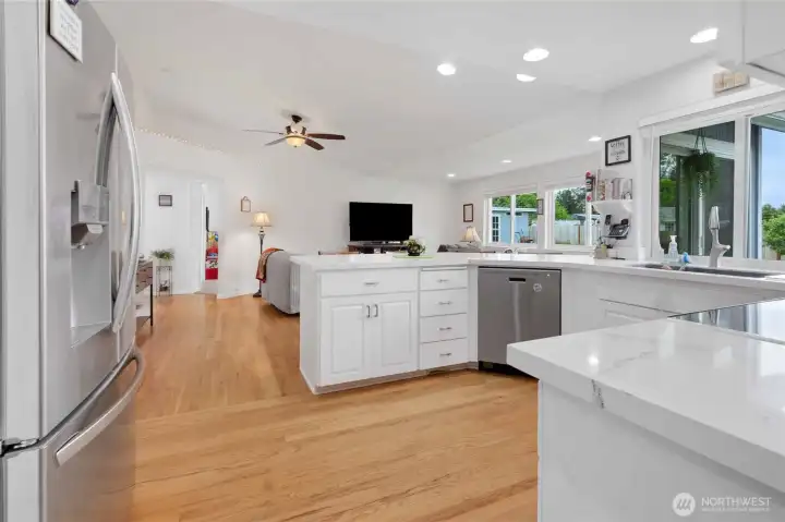 Looking into kitchen and great room from hallway.