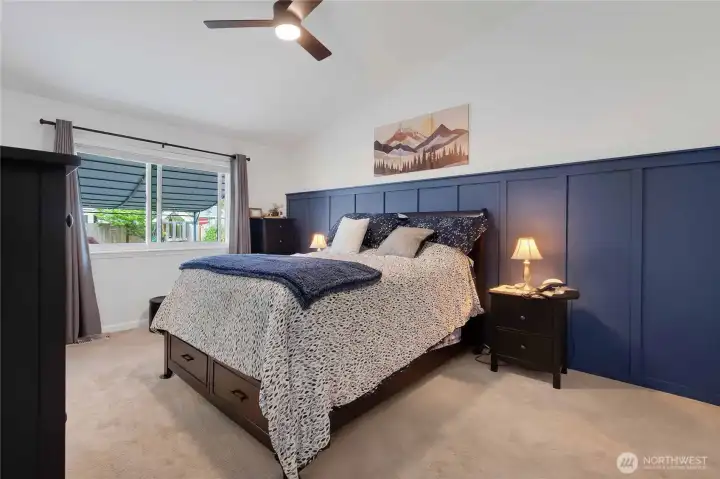 Primary bedroom is spacious and private off the back side of the home.