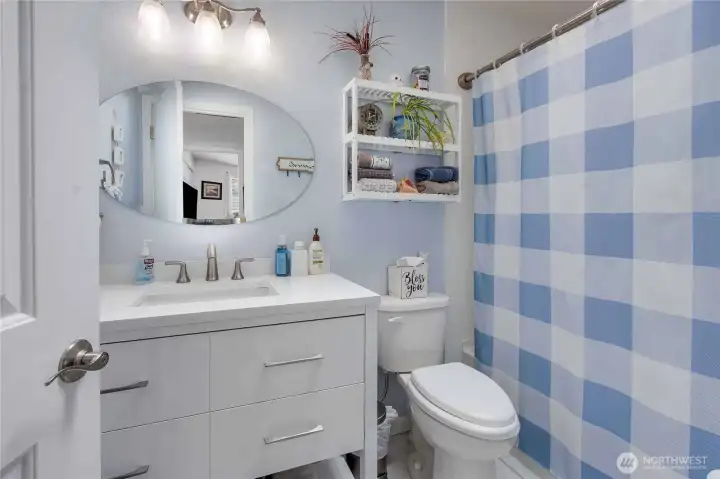 Guest bath updated with full tub/shower.