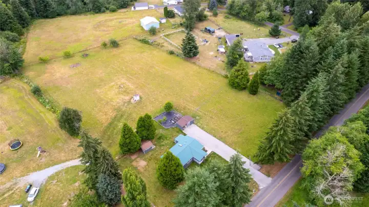 Drone shot showing this beautiful home and acreage