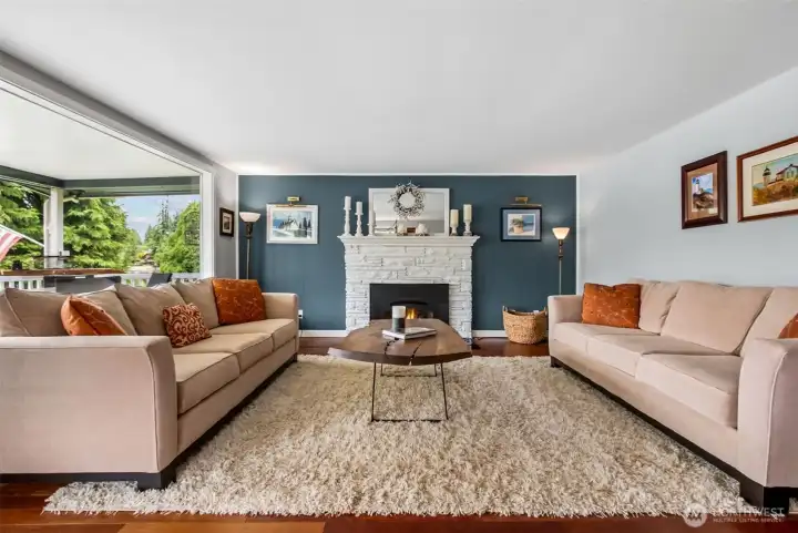 The gas fireplace with temperature remote adds practical warmth and ambiance. It’s a perfect complement to the lake views just beyond the windows.