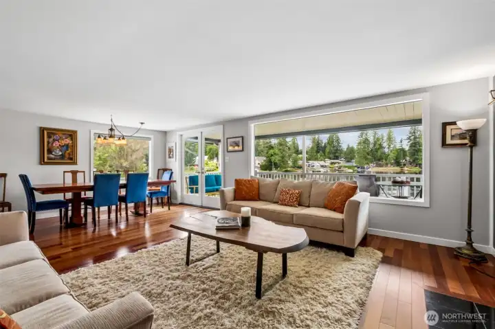 The living and dining rooms enjoy big windows that look straight out to the lake, giving you gorgeous views whether it’s summer sunshine or winter stillness. Gorgeous PNW waterfront views no matter the Season or weather.