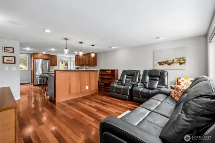 The kitchen and family room sit side-by-side, creating a comfortable gathering space where everyone can stay connected. Pull up bar stools at the counter and make it easy to chat with the cook, enjoy a snack, or keep an eye on the action in the family room.