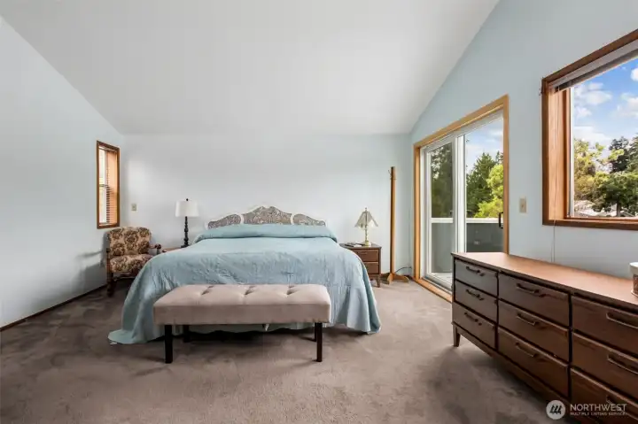 The entire upper level serves as a private owner’s retreat with vaulted ceilings and space to relax and recharge. Sliding doors open to a private deck with elevated lake views. It’s a peaceful escape at the end of each day. Seller is offering a $10,000 carpet allowance, so pick your color!