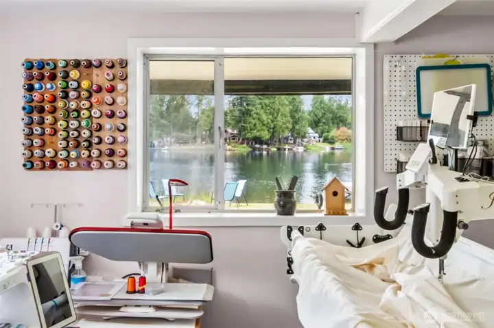 The daylight basement’s flex room adapts easily to your needs; media, fitness, hobbies, or play. Its size and brightness make it incredibly useful. It’s a true bonus space. It also houses the systems room and additional storage. Outside to the right of the exit door to the lake you'll find an additional storage room to house all of your lake toys year round.