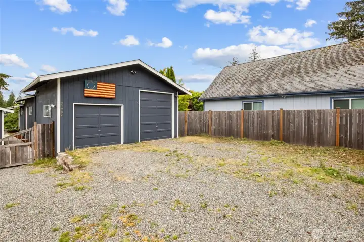 The upper parking area will easily hold 10 cars while the 2 car tandem garage with RV bay provide exceptional storage and workspace. A spacious shop area is perfect for outdoor enthusiasts and hobbyists who will appreciate the extra room to spread out. Maybe even convert to a MIL? Buyer to verify all information to their satisfaction. Home is on public water and sewer.