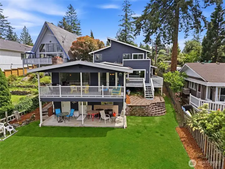 Both the backyard and lakeside yards blend natural beauty with functional outdoor living. Trees and landscaping create privacy while keeping views open. It’s a peaceful place to unwind.