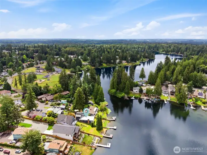 The two lakes are fully navigable, connected by a scenic channel that lets you move easily between Lake Lucerne and Pipe Lake. This passageway opens up even more opportunities for paddling, exploring, and enjoying the water without ever leaving your own shoreline. With both lakes known for exceptional clarity and spring-fed purity, the connection creates a rare, expanded waterfront experience that feels peaceful, private, and uniquely Northwest.