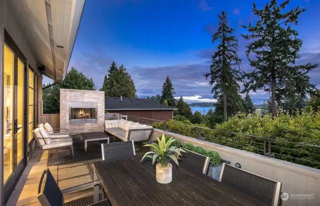 Dreamy outdoor living space with gas fireplace and views to BUY for!