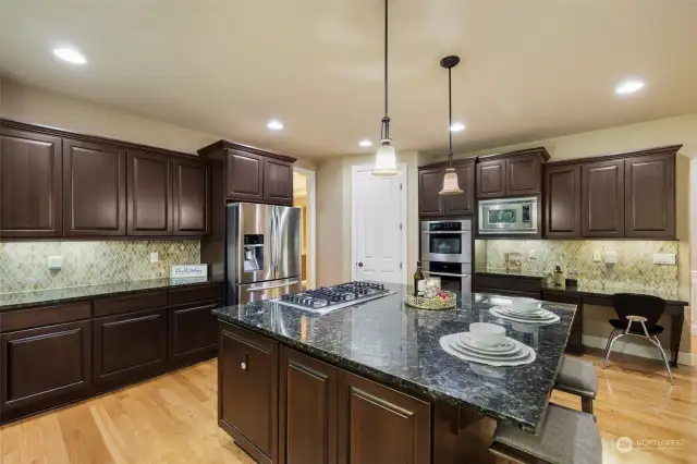 Super Large Kitchen w/ Custom Cabinets and Undermount Lighting.
