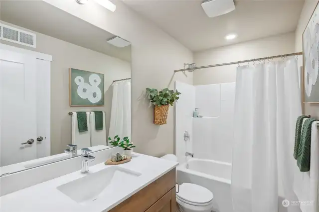 Photos are of model home in the same community.