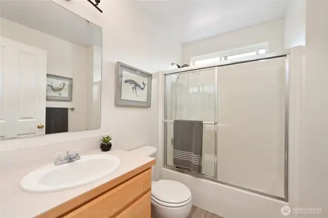 Full guest bath on upper floor.