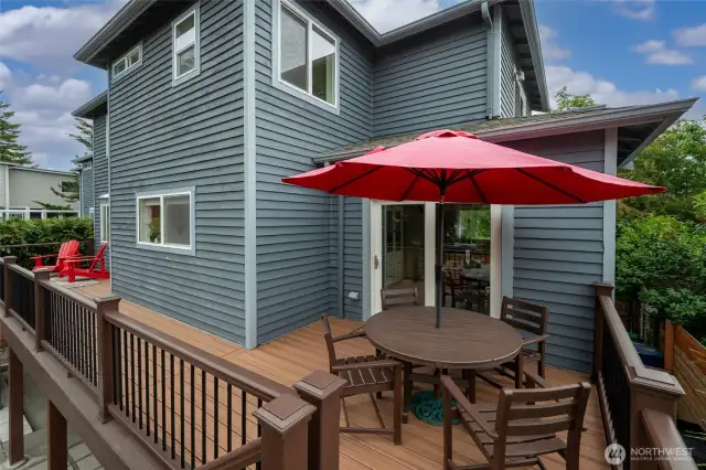 Large trex deck off of dining area and kitchen adds additional space for entertaining.
