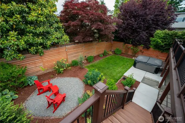 Private backyard oasis filled with perennials and plentiful garden space.