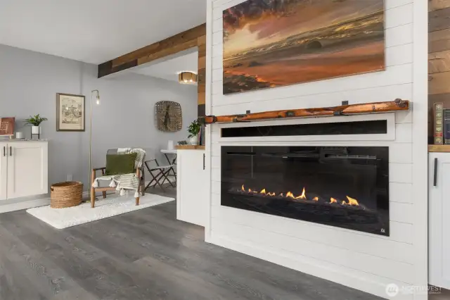 There is a 65" TV Mount behind the print above the fireplace.