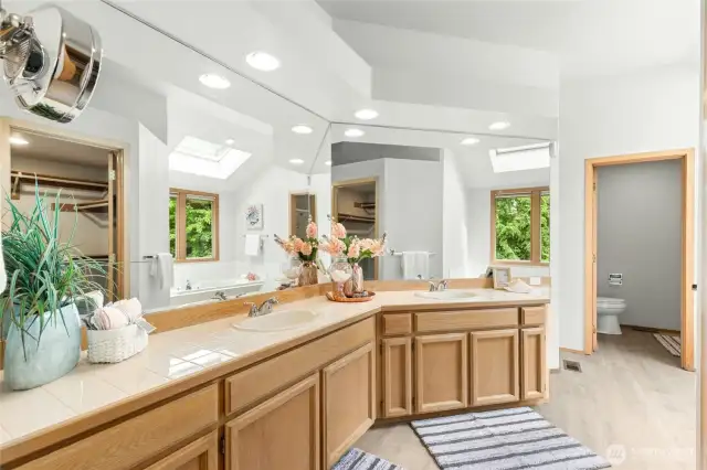 Primary bathroom with dual sinks.