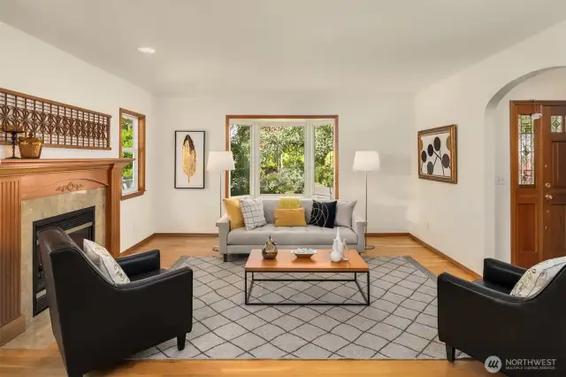 Bathed in natural light from windows, the formal living room is a bright and inviting retreat.