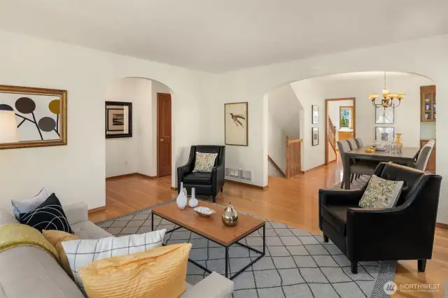 Distinctive arched entries on main level, adding architectural character and a touch of elegance.