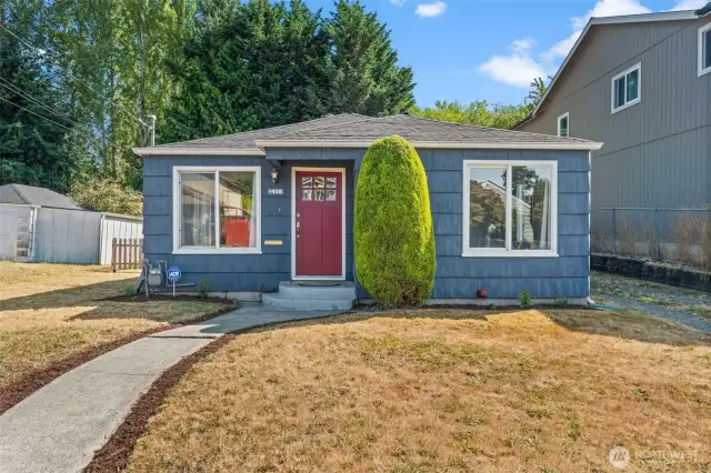 Charming curb appeal meets timeless design in this classic mid-century rambler, nestled on a quiet street in a peaceful Tacoma neighborhood.