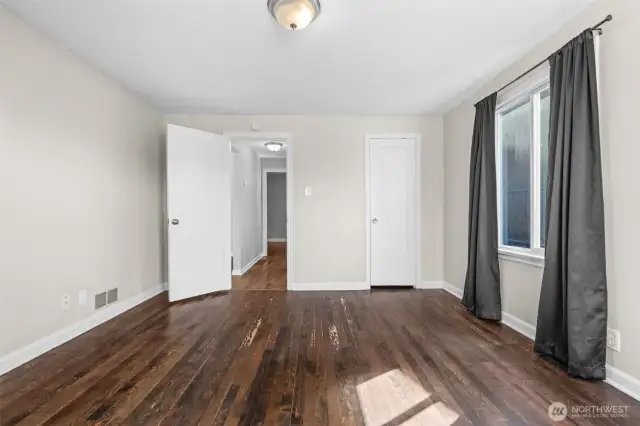 Warm-toned hardwood  brings comfort and style to every restful retreat