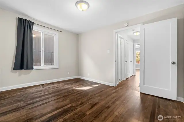 Warm-toned hardwood  brings comfort and style to every restful retreat