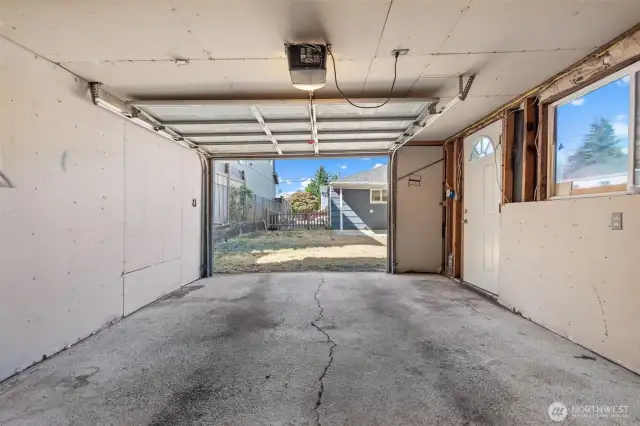 Spacious interior with room for parking and storage.