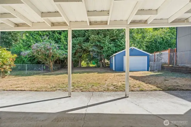 Step out into your private, fully fenced backyard—an ideal setting for summertime BBQs and evening relaxation