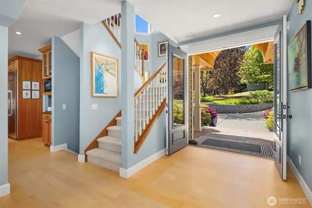 This shot is taken from the living room showing the stairs and front door