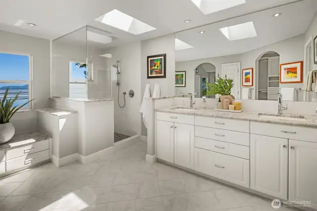 The primary suite has heating floors, dual sinks & walk-in shower