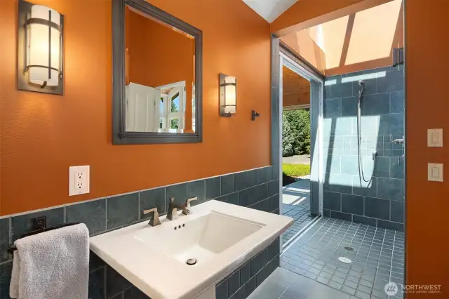 The bathroom in the studio features an indoor/outdoor shower