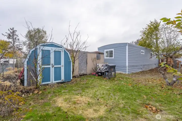 Large lot with storage sheds