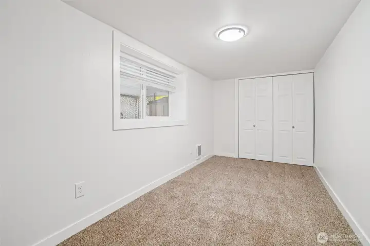 second bedroom—ideal for guests or office space.