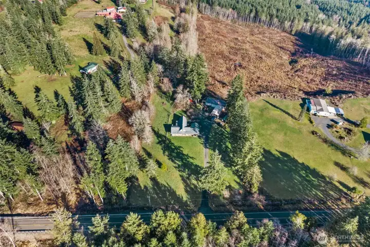 Overhead look at the property’s setting within the surrounding countryside.