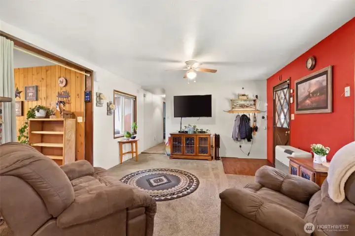 Comfortable living room filled with natural light—perfect for relaxing or entertaining.