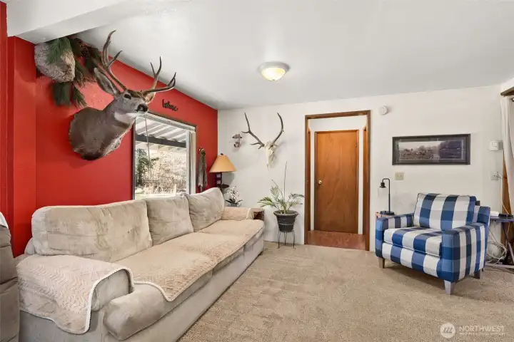 Flexible layout featuring dual seating areas to accommodate everyday living and guests.