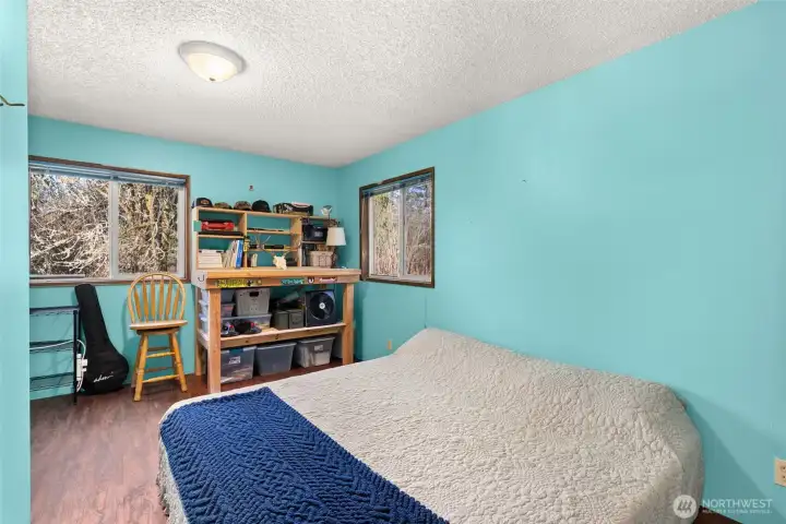 Versatile third bedroom—ideal for guests, office, or hobby space.