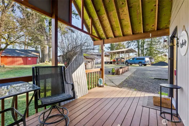 Covered Deck: Perfect for year-round outdoor enjoyment and easy access to the kitchen for outdoor entertaining.