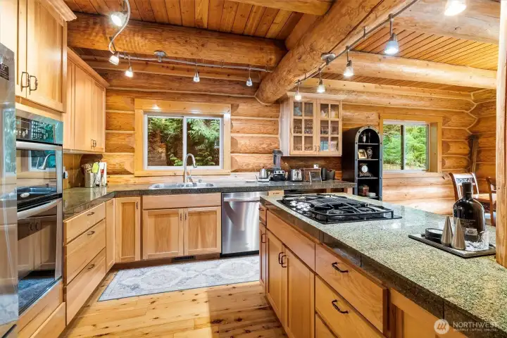 Large open-concept kitchen with ample cabinet storage.